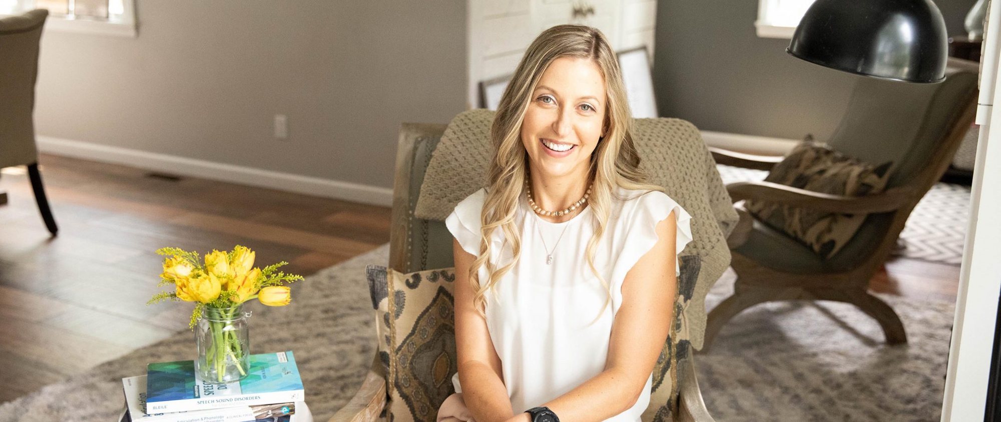 Nicole Kolenda smiling in her office